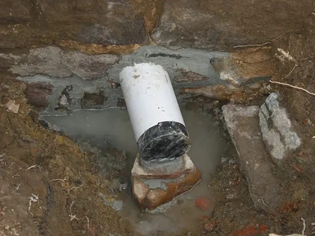 Exterior view of new DeTurk kitchen drain outlet pipe