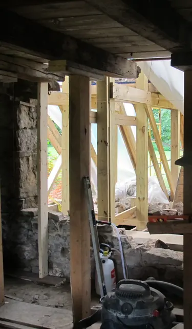 Unstable wall removed to foundation plinth