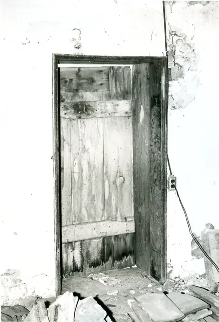 DeTurk house, interior doorway through west wall from former kitchen (1973)
