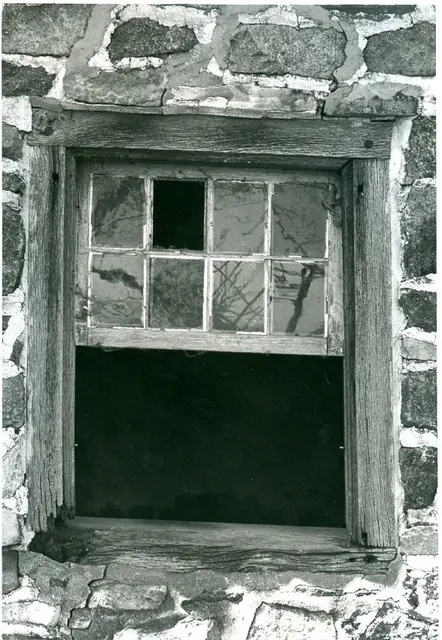 DTH, first-floor north window missing lower sash in east eaves wall (1973)